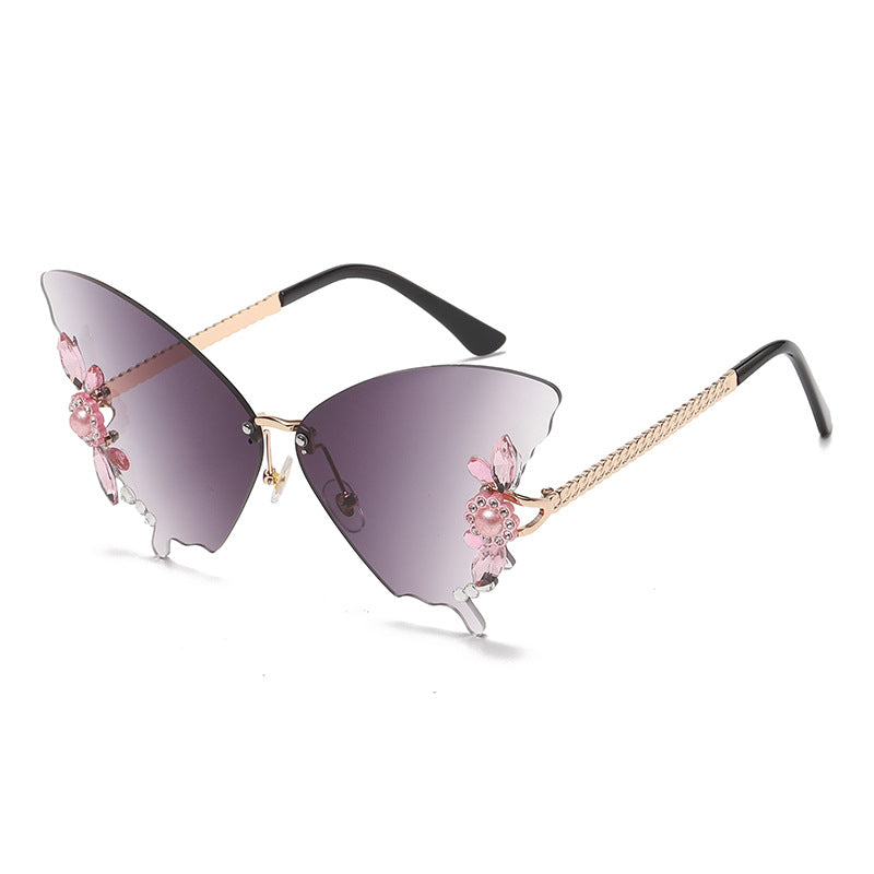 Gafas de sol de PC sin borde de diamante de forma de mariposa al por mayor